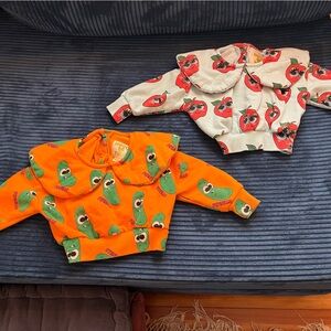 Set of 2 Hugo loves Tiki sweatshirts